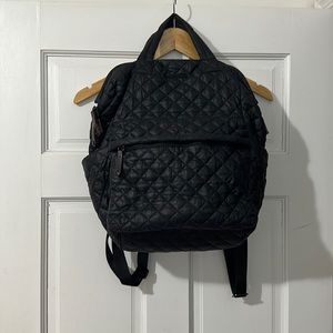 gently used all black “quilted” detail backpack by MZ WALLACE